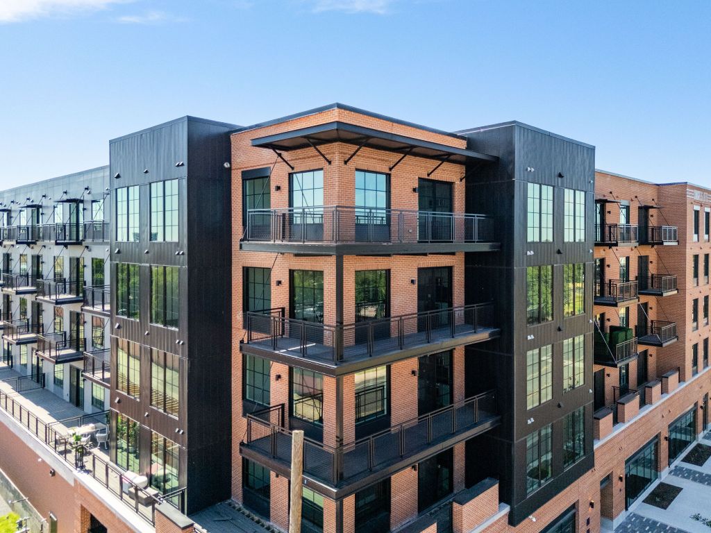 4315 South Congress Avenue, Unit 523 Austin, TX 78745 - Photo 31 of 32 a front view of a building with glass windows