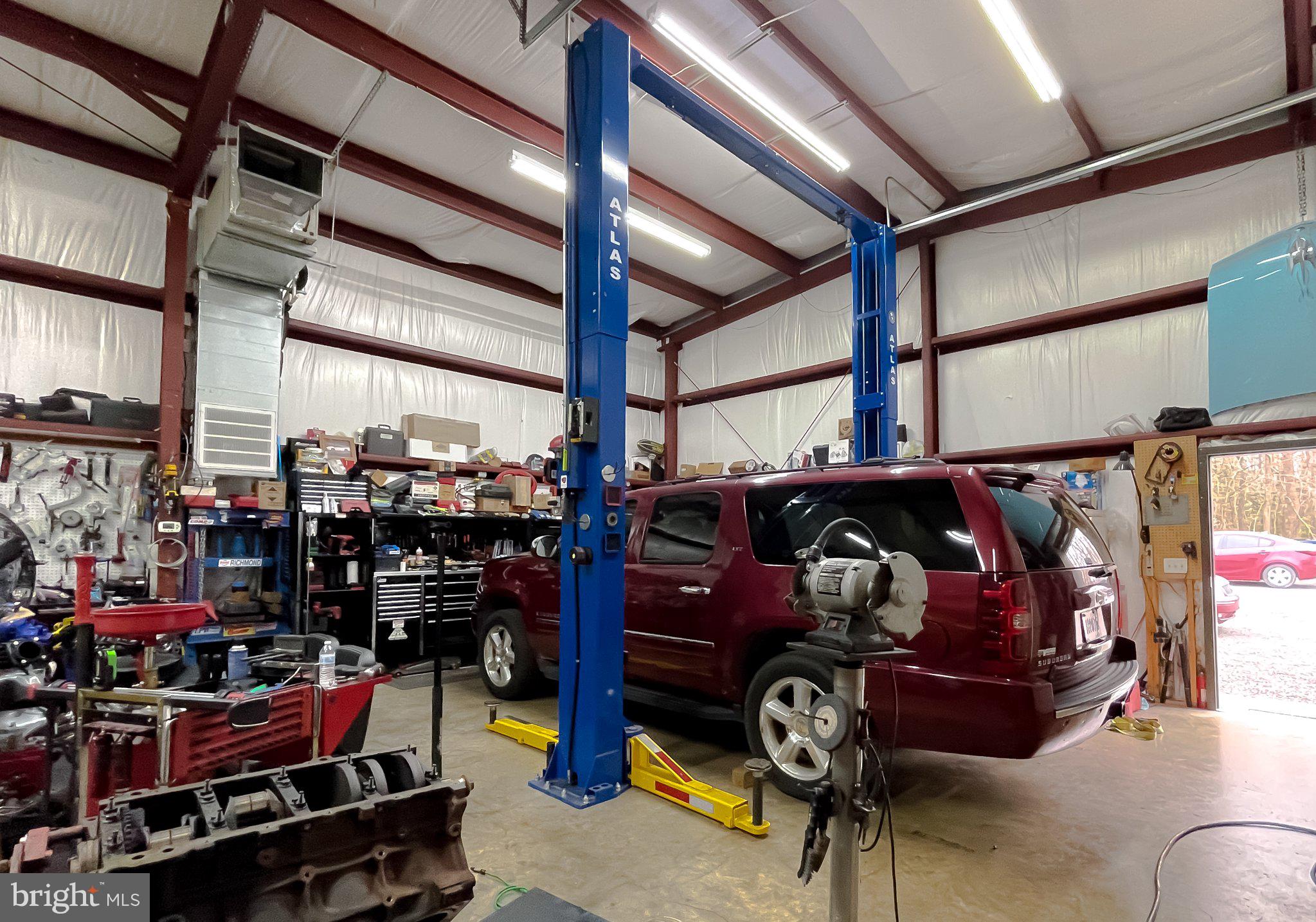 400 Adelina Road Prince Frederick, MD 20678 - Photo 28 of 57 Well-equipped garage for auto repairs.