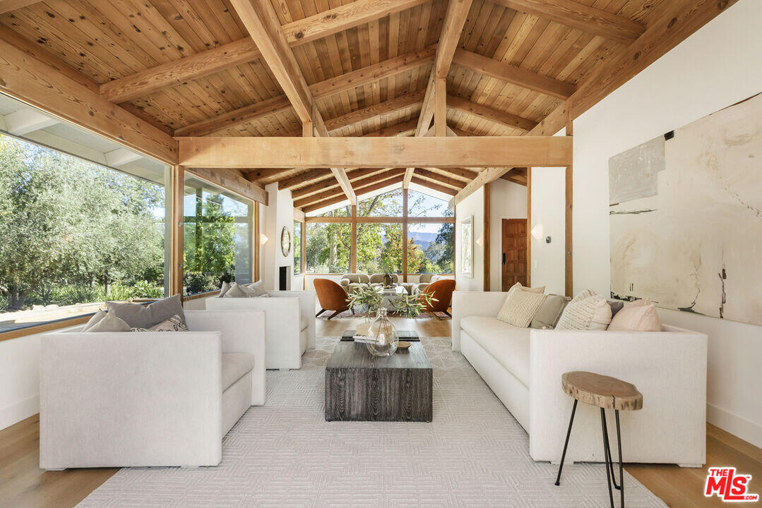 545 Del Oro Drive Ojai, CA 93023 - Photo 11 of 67 a living room with furniture and a large window