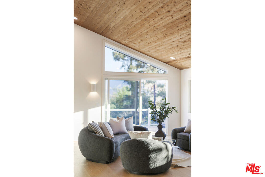 545 Del Oro Drive Ojai, CA 93023 - Photo 32 of 67 a living room with furniture and a large window