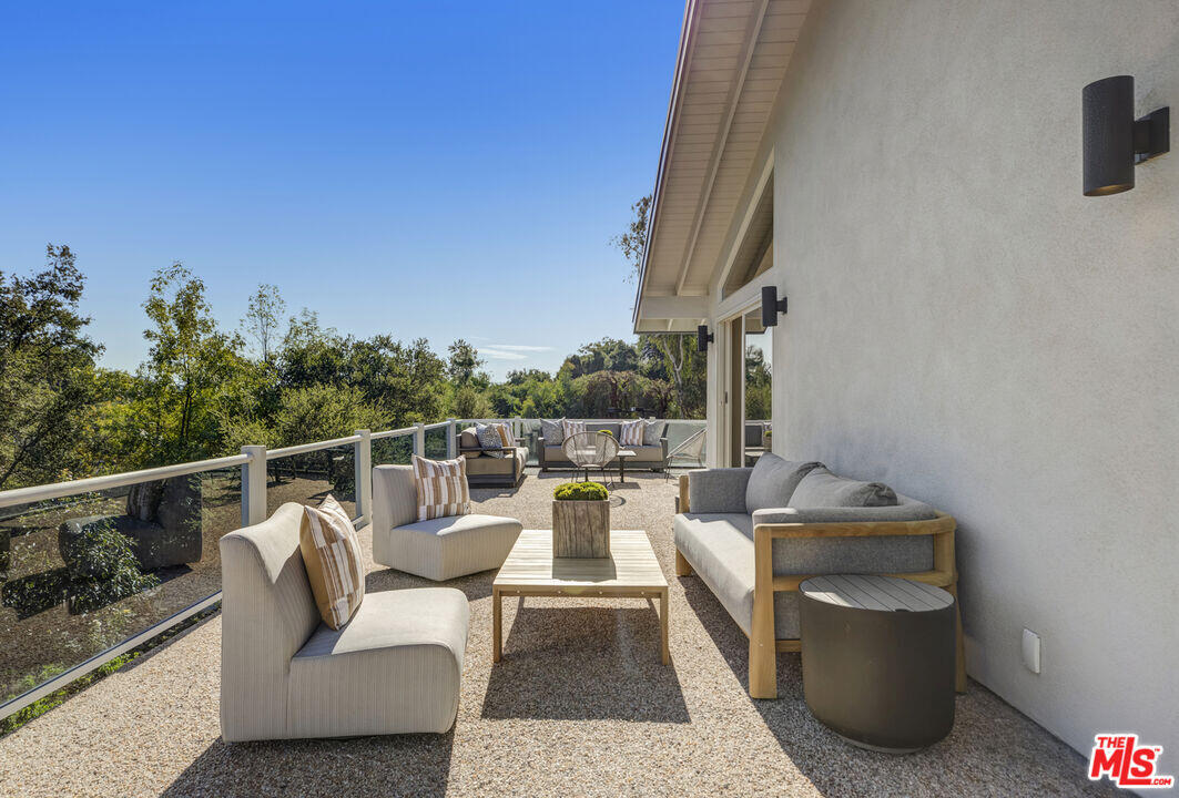 545 Del Oro Drive Ojai, CA 93023 - Photo 34 of 67 a view of a roof deck with couches and sky view