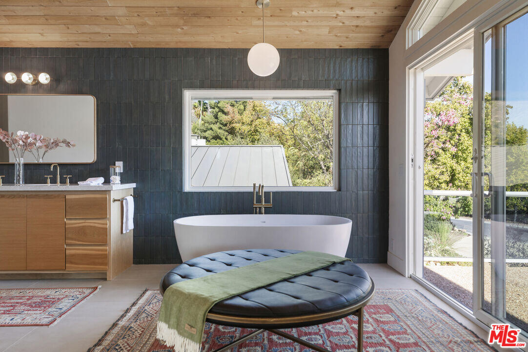 545 Del Oro Drive Ojai, CA 93023 - Photo 37 of 67 a view of a dining room with furniture wooden floor and a chandelier