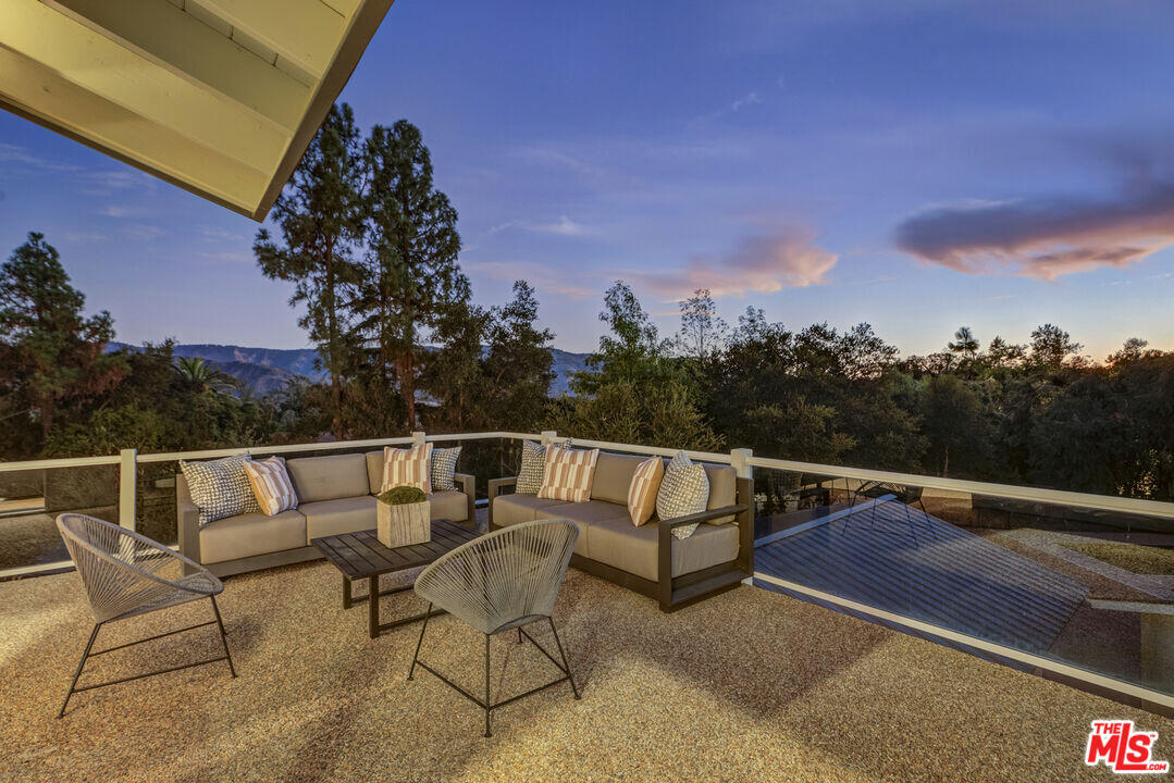 545 Del Oro Drive Ojai, CA 93023 - Photo 41 of 67 a view of a roof deck with couches and sky view