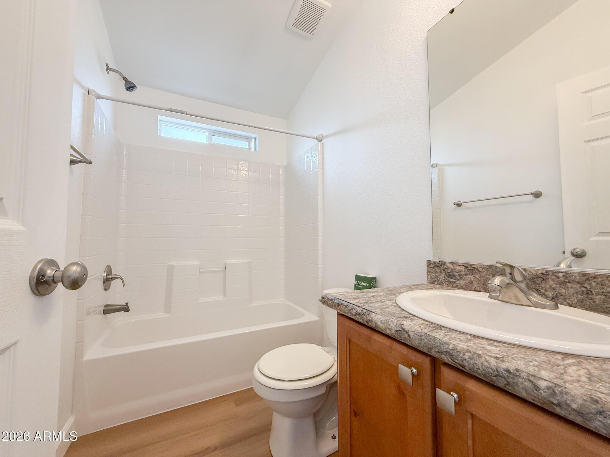 51880 North Gold Plains Road Seligman, AZ 86337 - Photo 18 of 24 a bathroom with a granite countertop sink toilet and shower