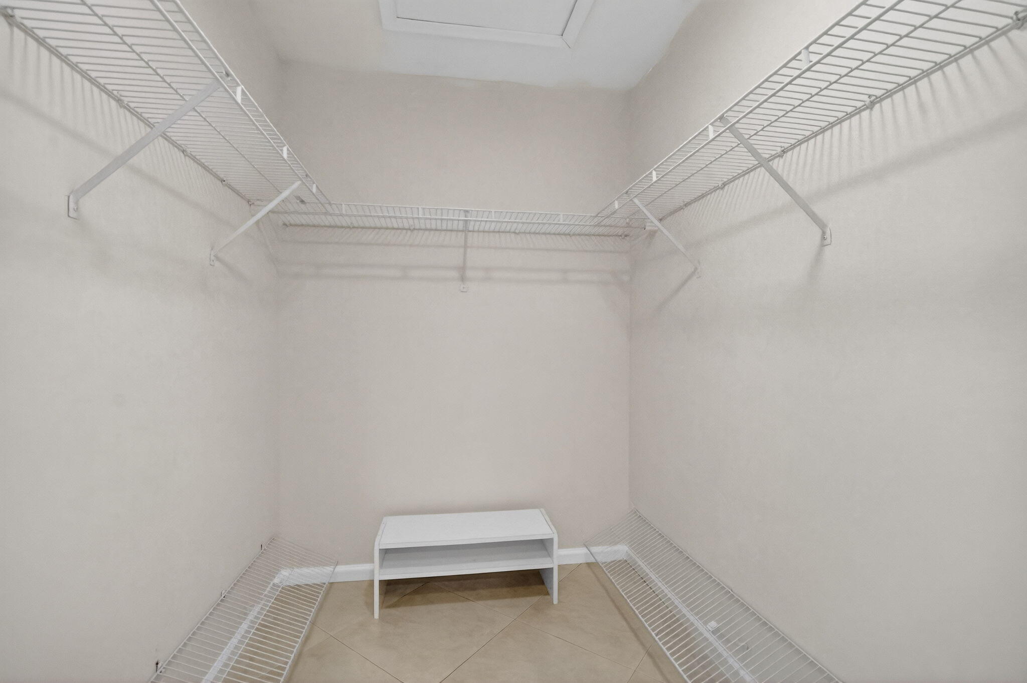 10194 Canoe Brook Circle Boca Raton, FL 33498 - Photo 16 of 42 a view of an empty walk in closet