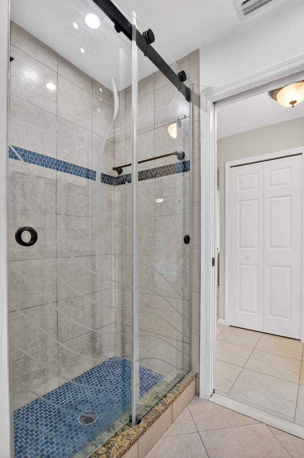 10194 Canoe Brook Circle Boca Raton, FL 33498 - Photo 27 of 42 a bathroom with a shower