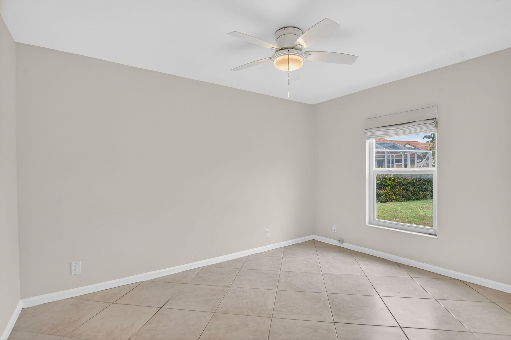 10194 Canoe Brook Circle Boca Raton, FL 33498 - Photo 28 of 42 an empty room with a window