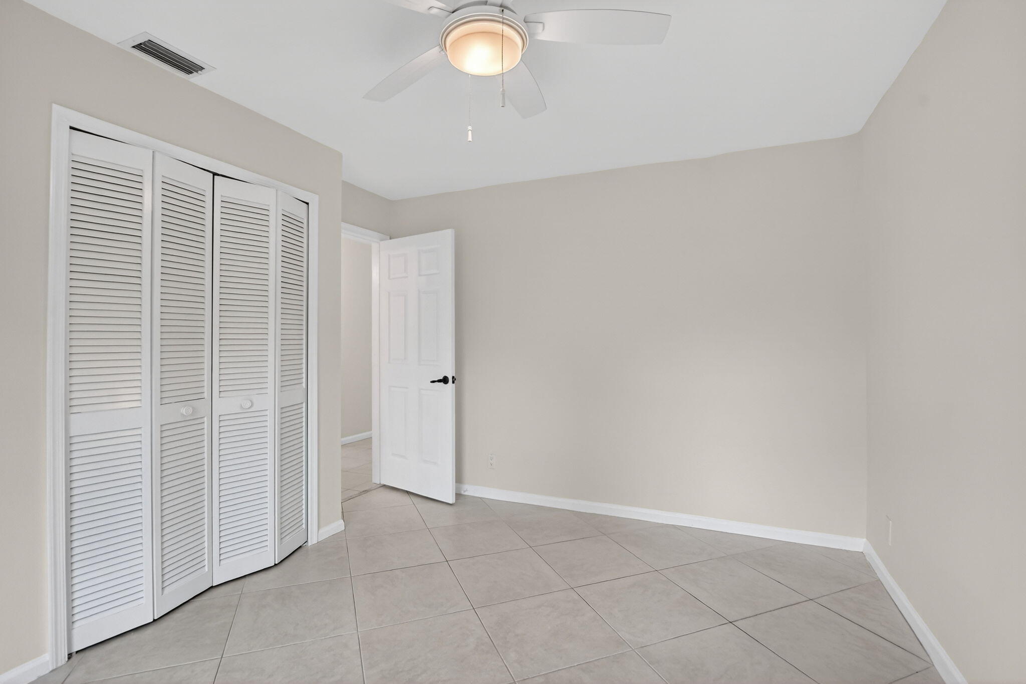 10194 Canoe Brook Circle Boca Raton, FL 33498 - Photo 29 of 42 an empty room with a space