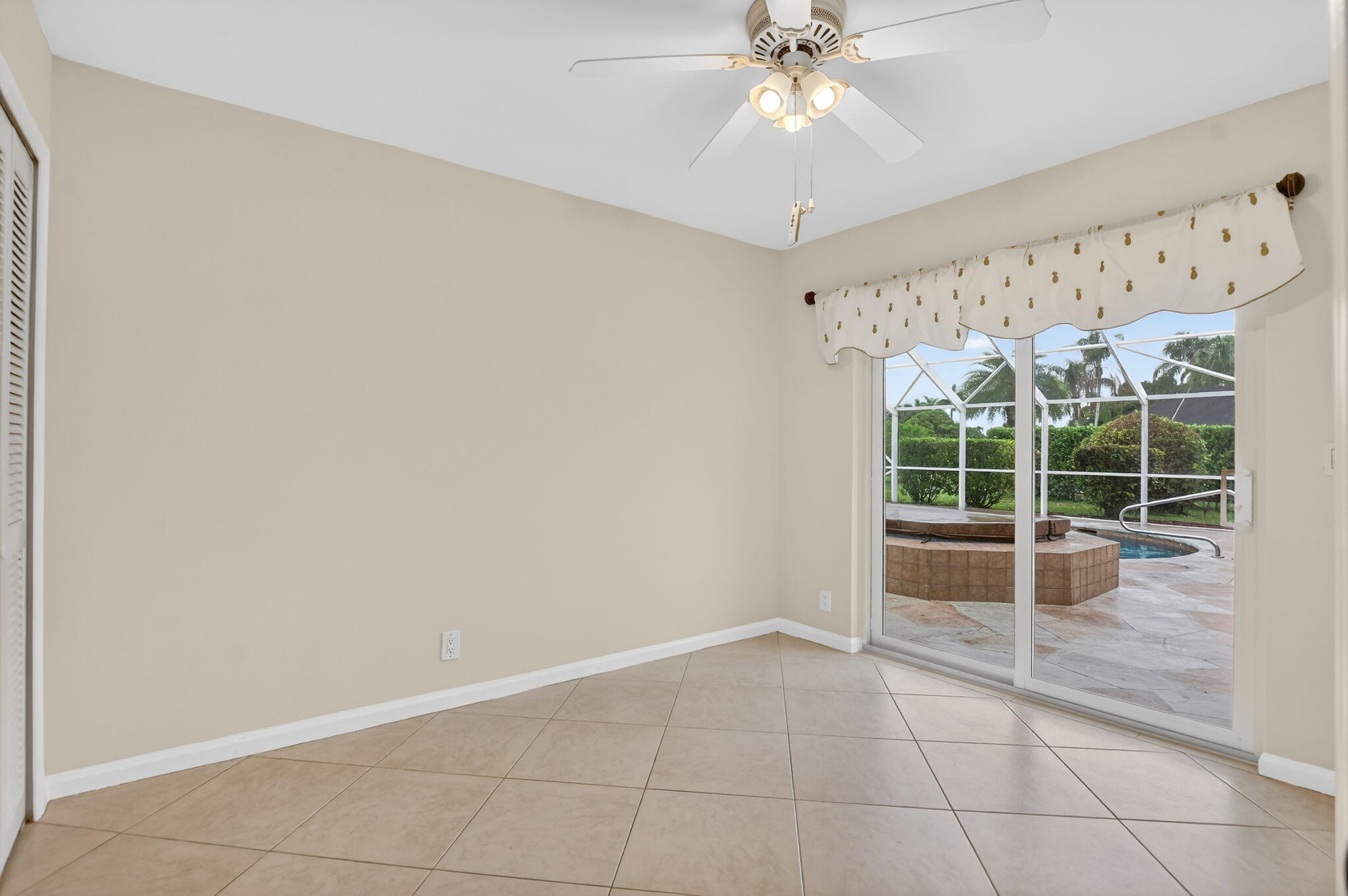 10194 Canoe Brook Circle Boca Raton, FL 33498 - Photo 32 of 42 a view of an empty room with a window