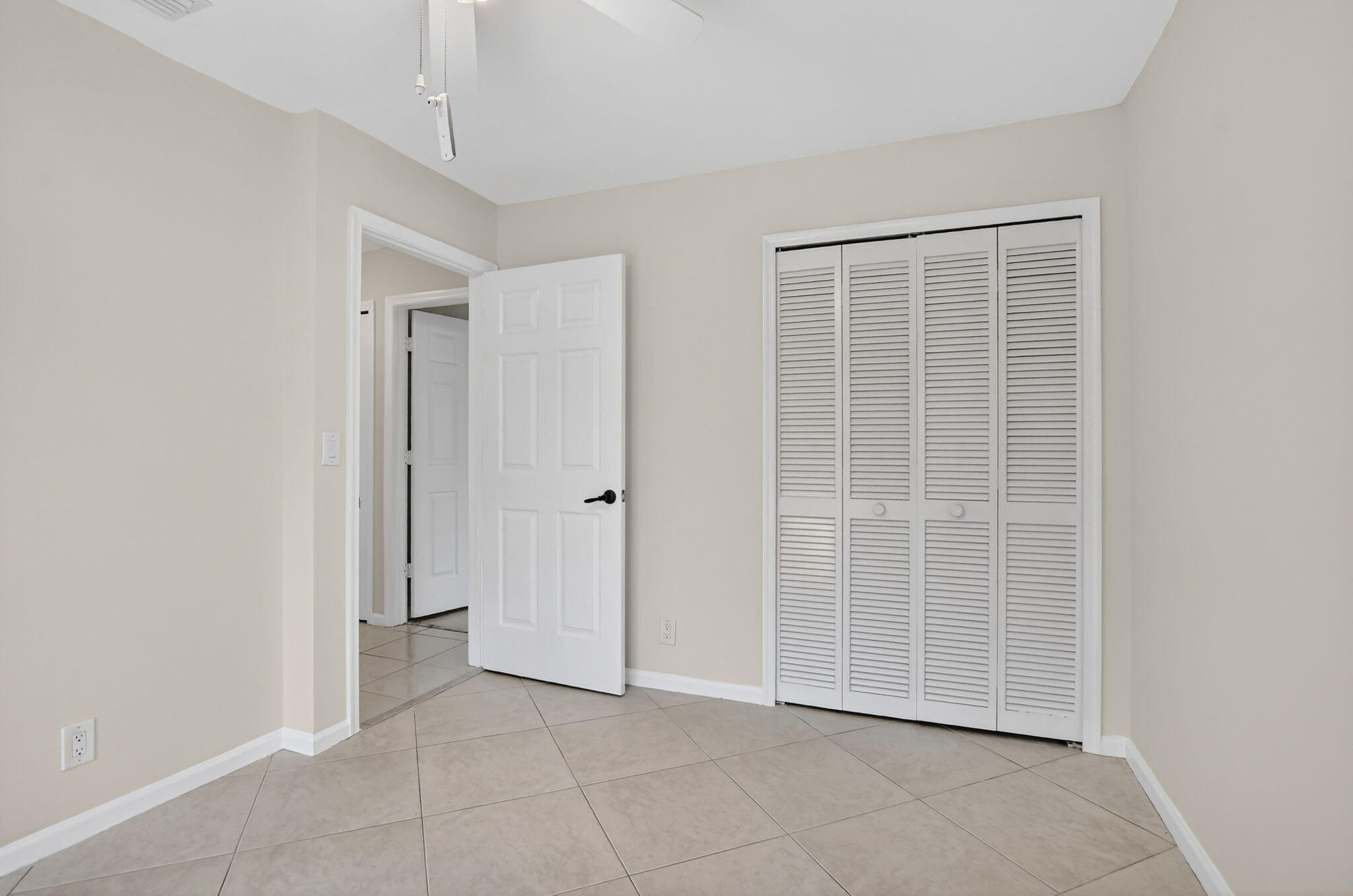 10194 Canoe Brook Circle Boca Raton, FL 33498 - Photo 33 of 42 an empty room with windows