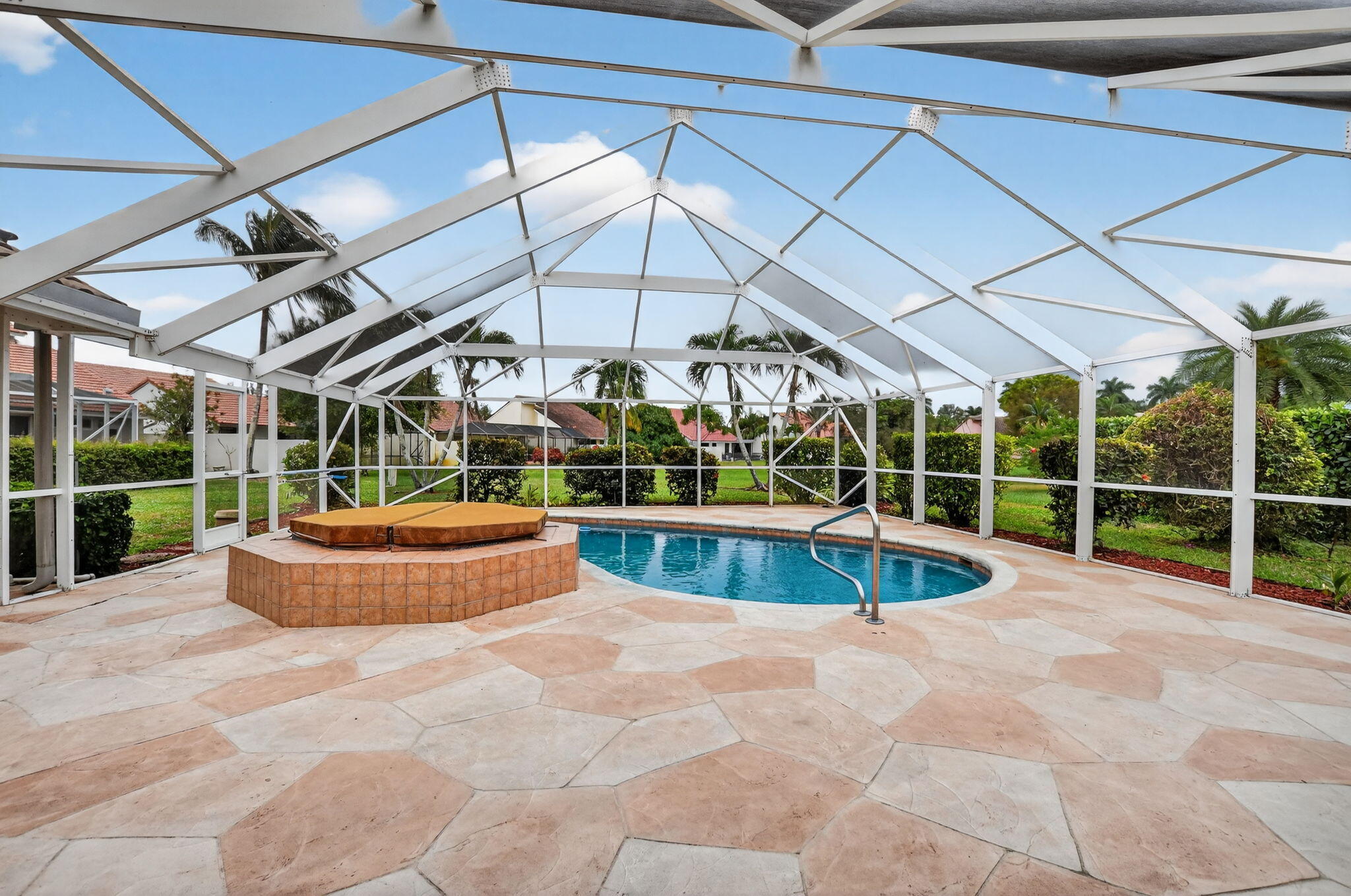 10194 Canoe Brook Circle Boca Raton, FL 33498 - Photo 35 of 42 a view of a swimming pool with a patio
