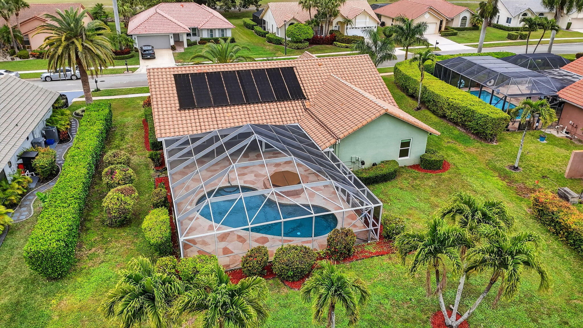 10194 Canoe Brook Circle Boca Raton, FL 33498 - Photo 36 of 42 an aerial view of a house with swimming pool and outdoor space