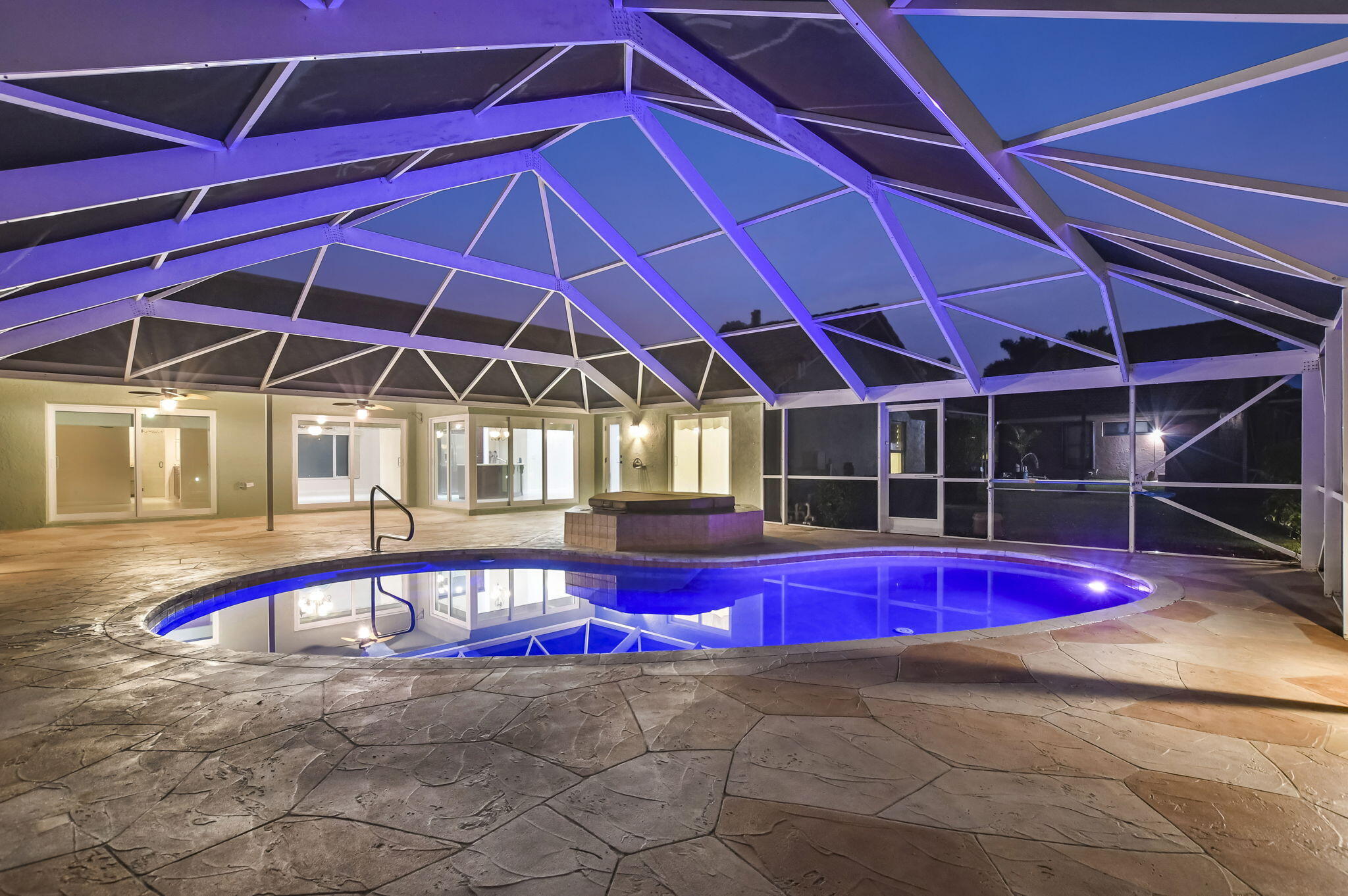 10194 Canoe Brook Circle Boca Raton, FL 33498 - Photo 39 of 42 a view of a swimming pool with red chairs