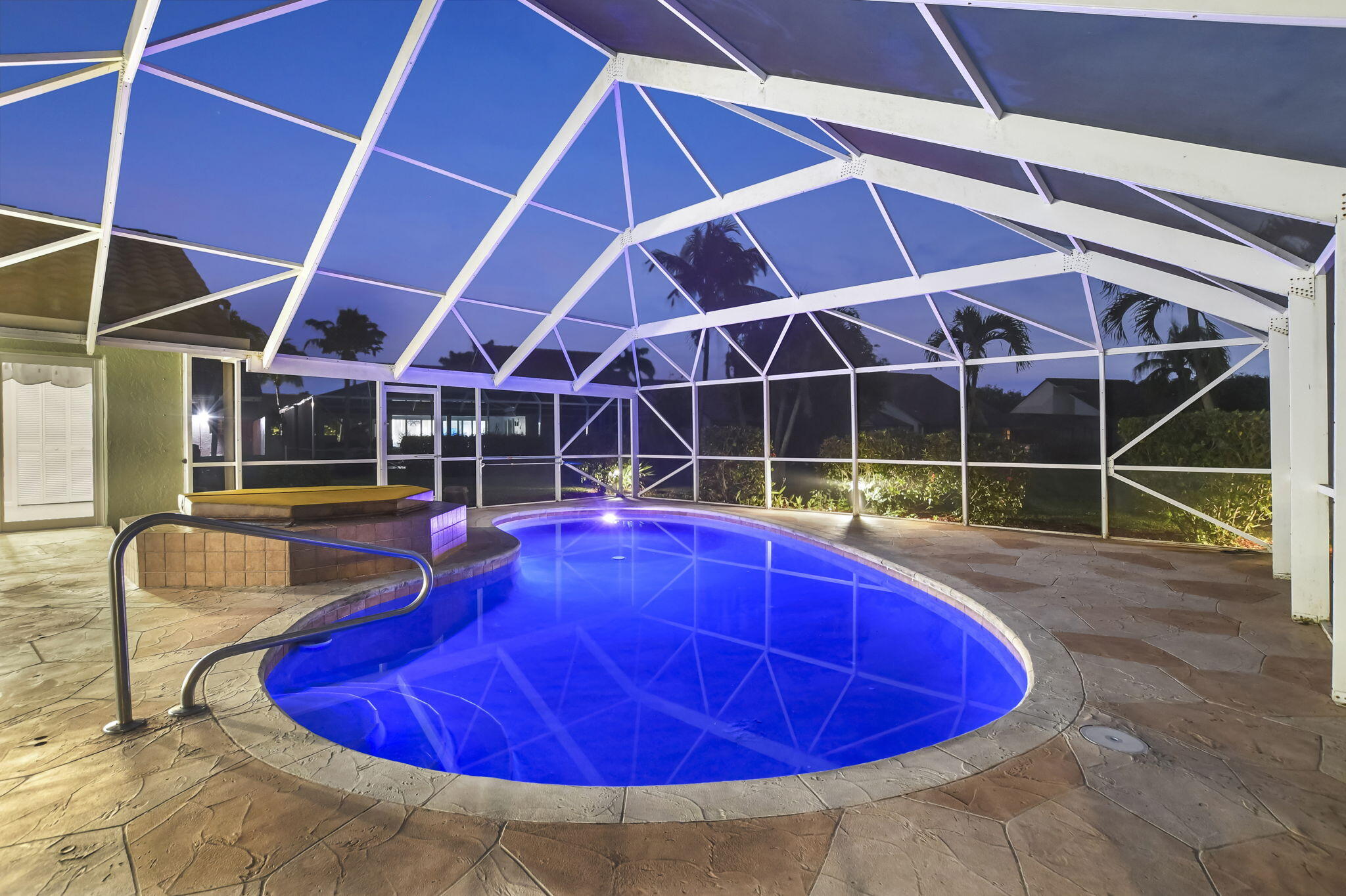 10194 Canoe Brook Circle Boca Raton, FL 33498 - Photo 40 of 42 a view of a swimming pool with a lounge chairs