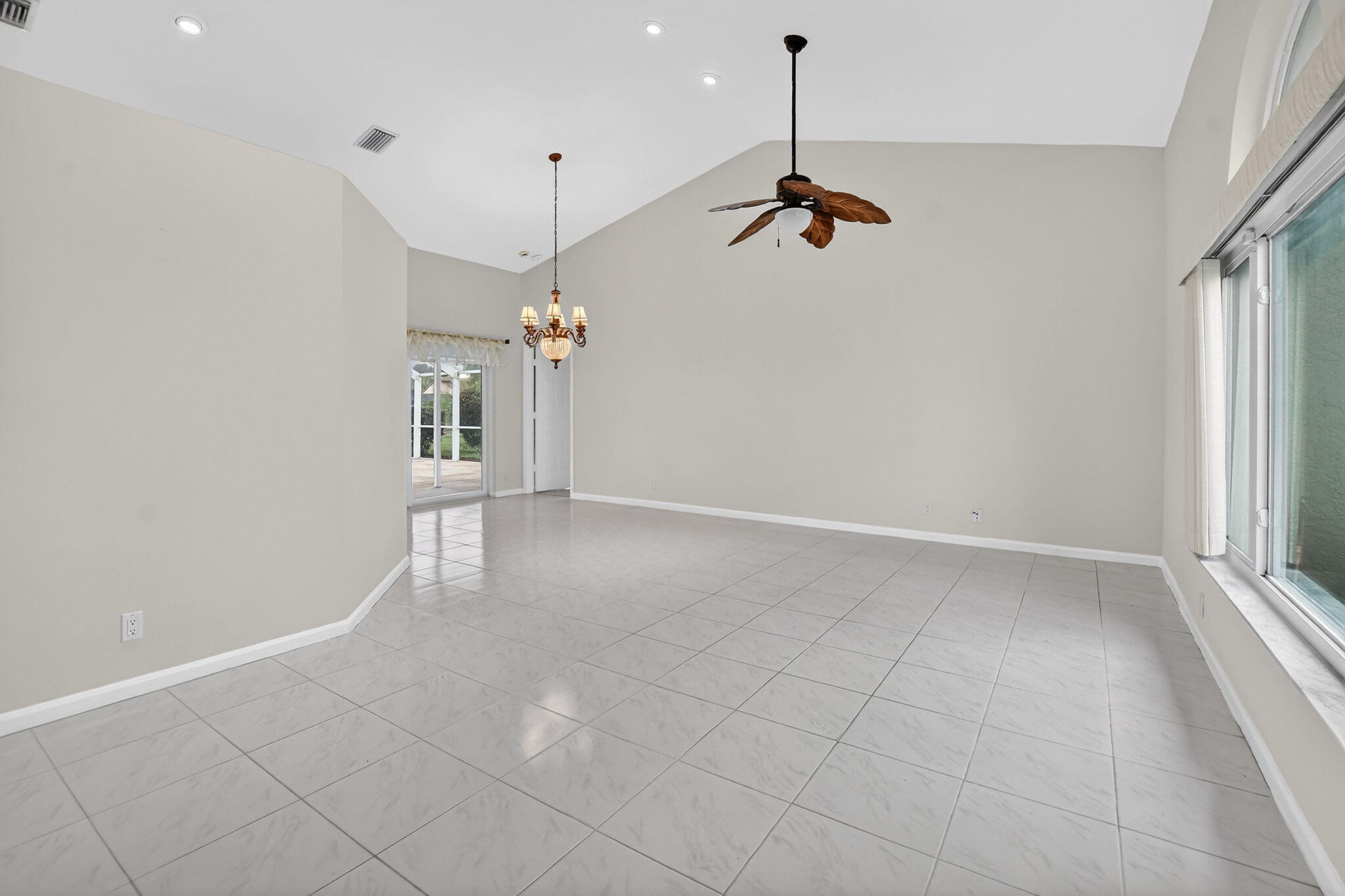10194 Canoe Brook Circle Boca Raton, FL 33498 - Photo 8 of 42 a view of a room with a ceiling fan
