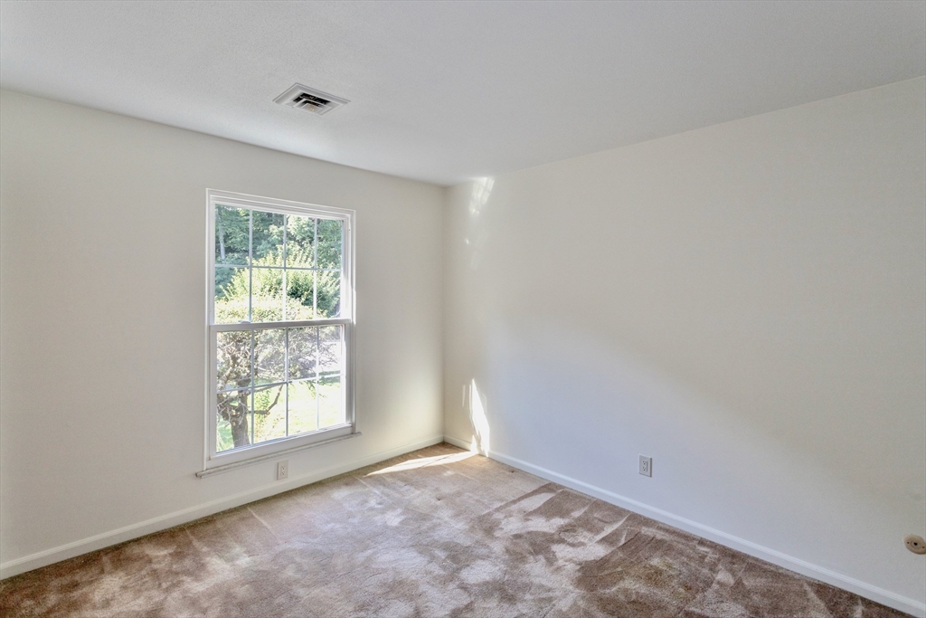 324 Russell Road, Unit 204 Westfield, MA 01085 - Photo 11 of 31 an empty room with windows