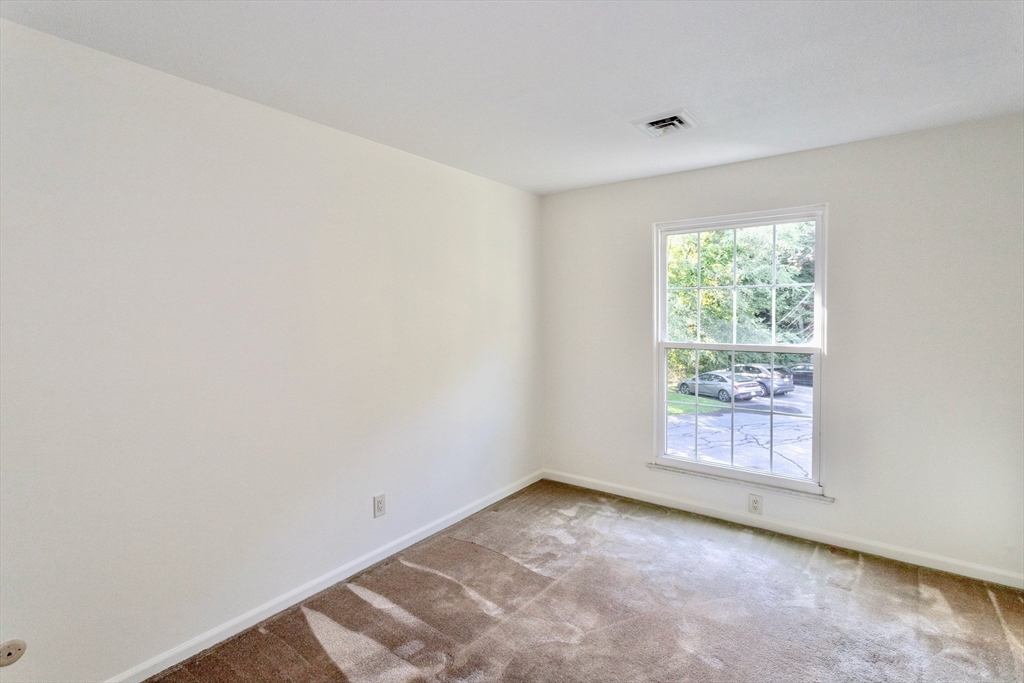 324 Russell Road, Unit 204 Westfield, MA 01085 - Photo 14 of 31 an empty room with windows