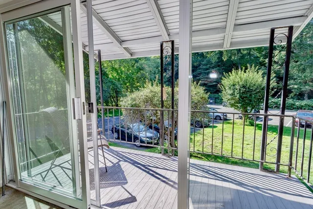 a view of a hallway with windows