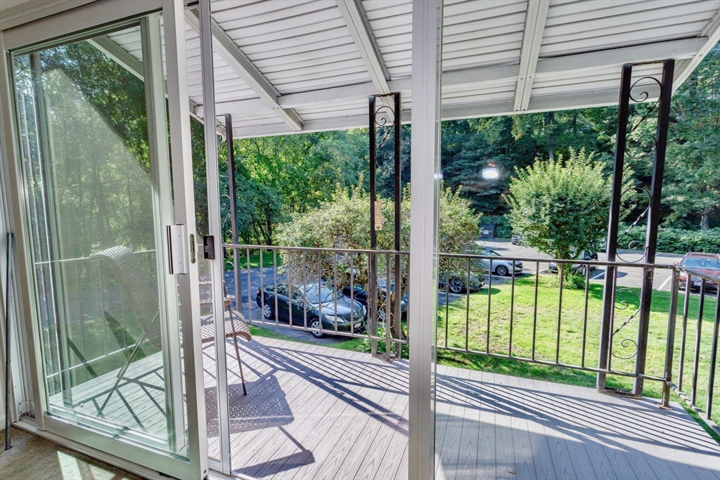 324 Russell Road, Unit 204 Westfield, MA 01085 - Photo 27 of 31 a view of a room with a large window and wooden floor