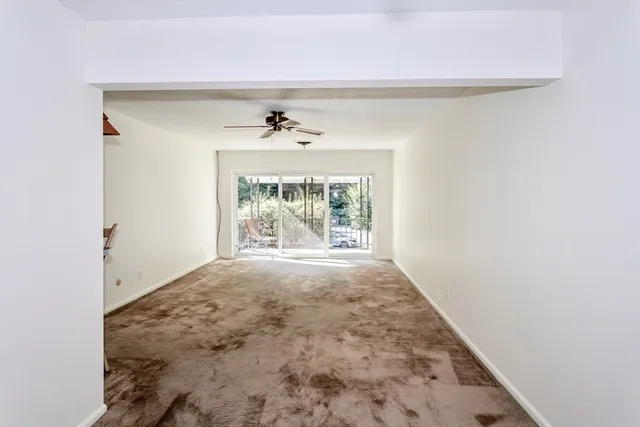 a view of empty room with front door