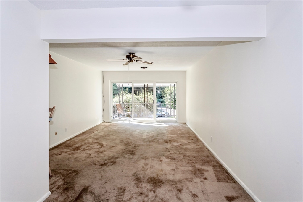 324 Russell Road, Unit 204 Westfield, MA 01085 - Photo 9 of 31 a view of empty room with front door