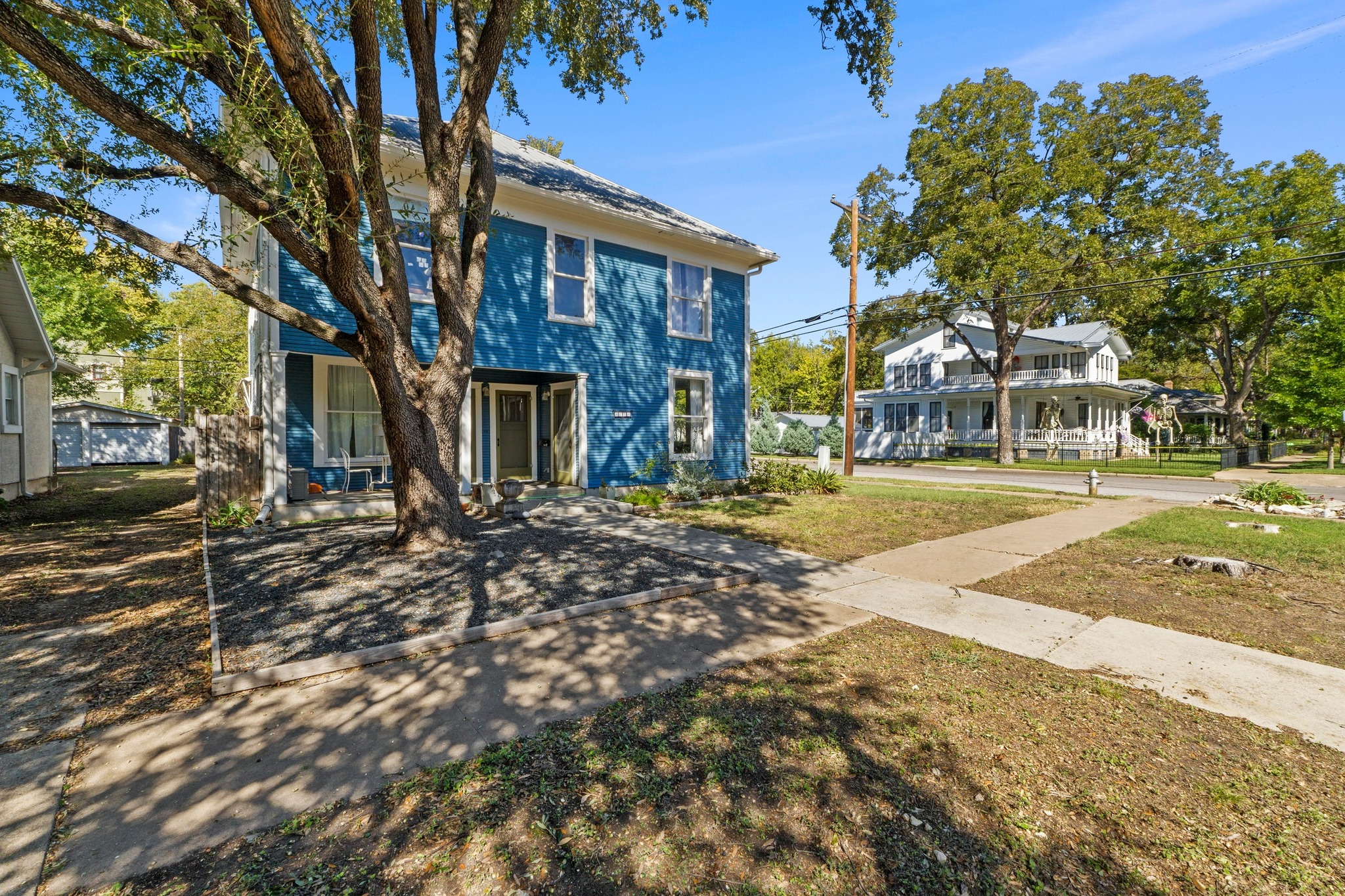 4014 Avenue D Austin, TX 78751 - Photo 2 of 34 a front view of a house with a yard