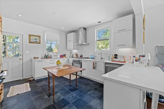 a view of kitchen with breakfast area