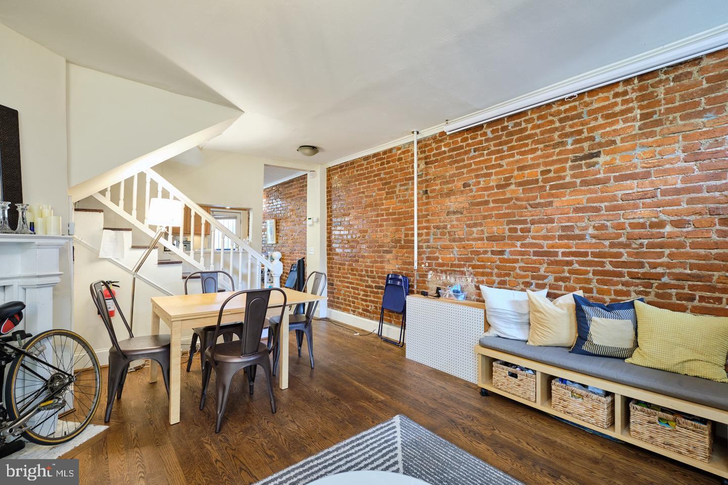 537 3rd Street Northeast Washington, DC 20002 - Photo 5 of 6 Main level - exposed brick