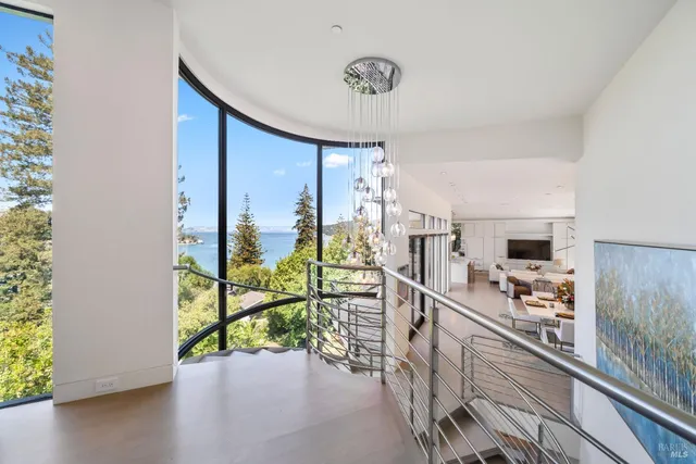 a view of a porch with furniture and front door