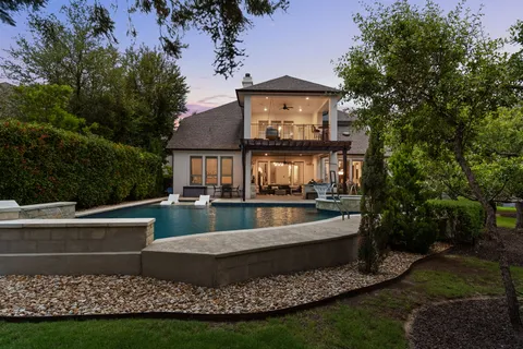 a view of a house with a swimming pool