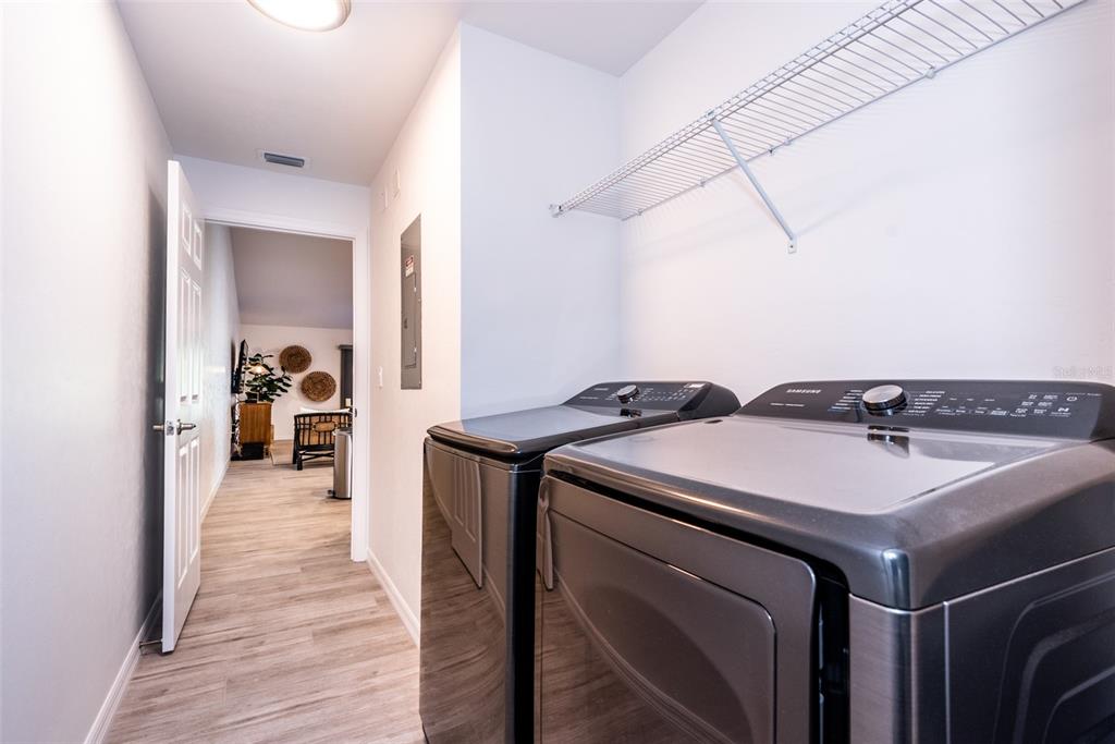 219 Lewis Circle, Unit 112 Punta Gorda, FL 33950 - Photo 33 of 36 a utility room with dryer and washer