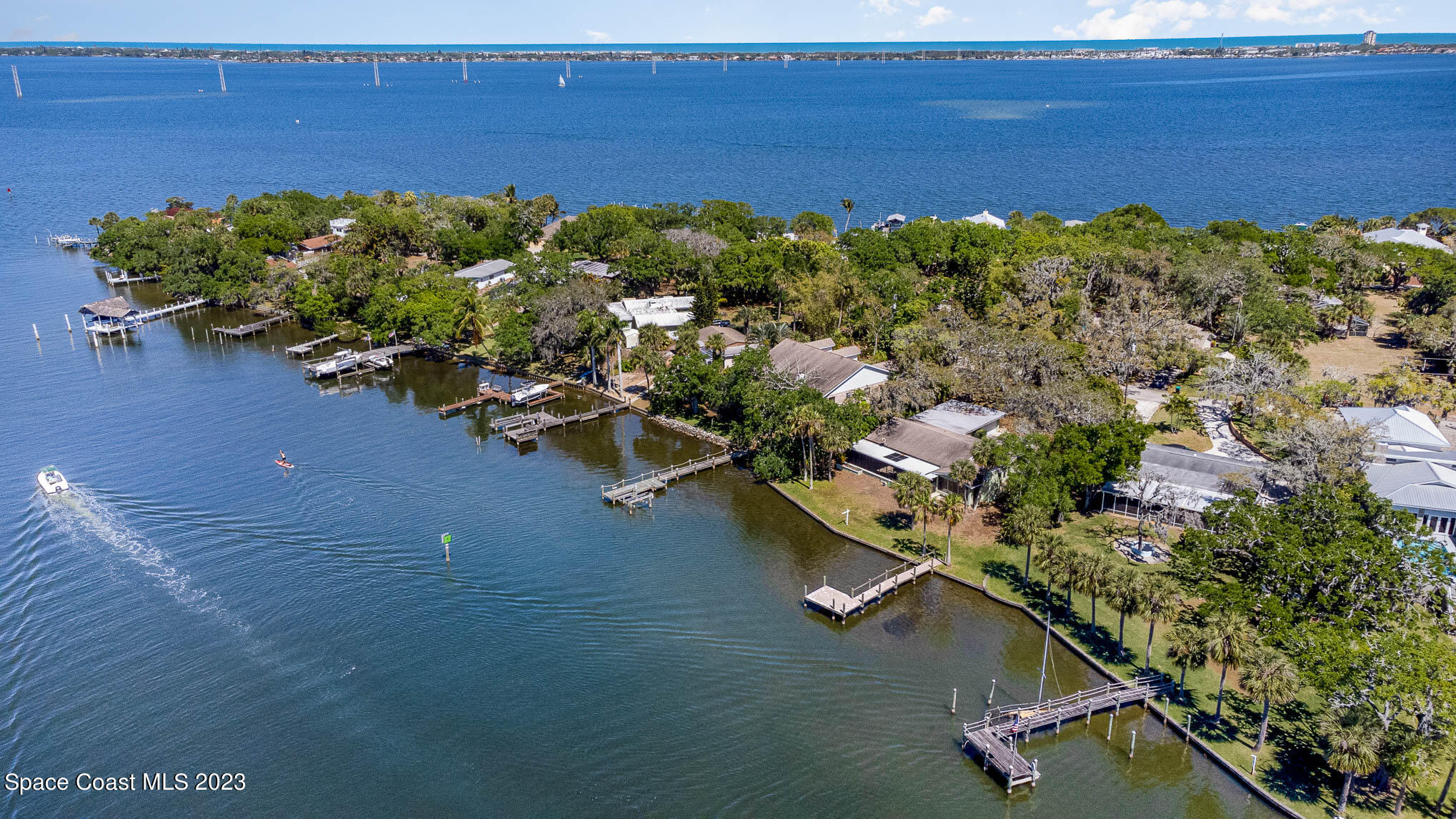 1466 Herndon Circle Palm Bay, FL 32905 - Photo 3 of 23 an aerial view of a house with a yard lake lake view