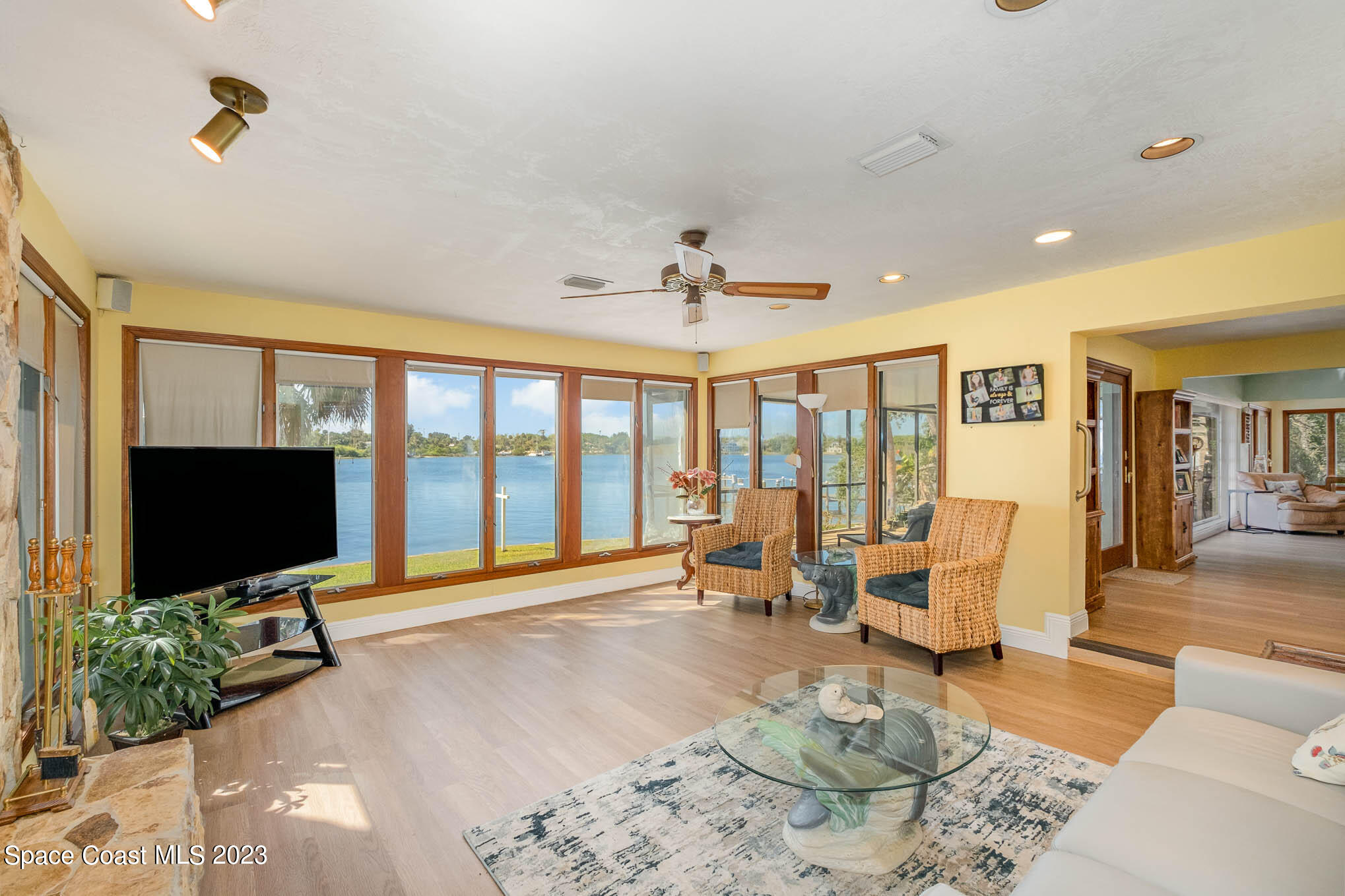 1466 Herndon Circle Palm Bay, FL 32905 - Photo 6 of 23 a living room with furniture and a flat screen tv