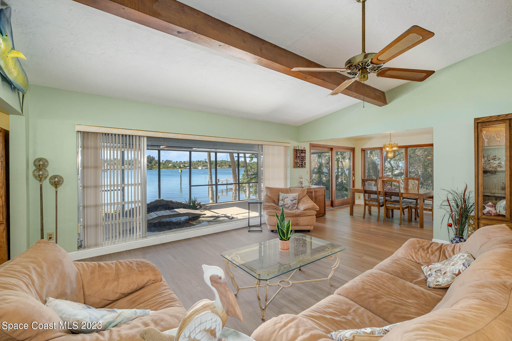 1466 Herndon Circle Palm Bay, FL 32905 - Photo 8 of 23 a living room with furniture and a large window