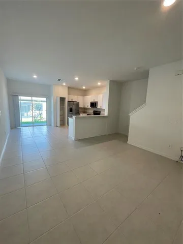 a view of a kitchen with a sink