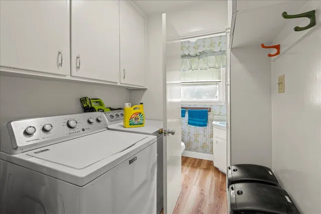 a utility room with dryer and washer