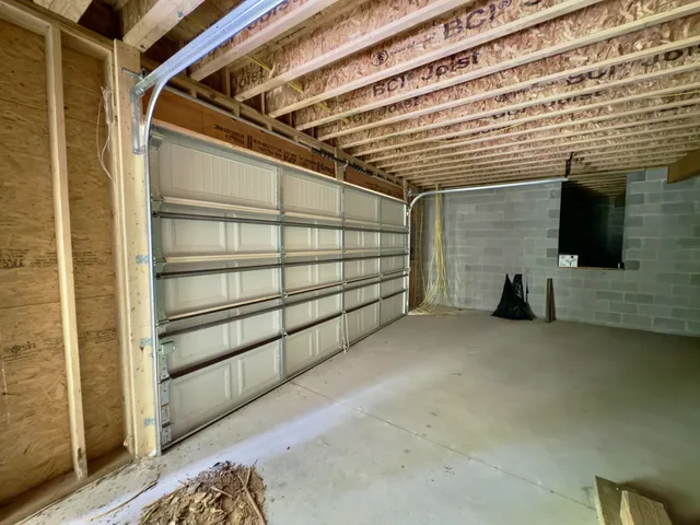 a view of an empty room with a fireplace