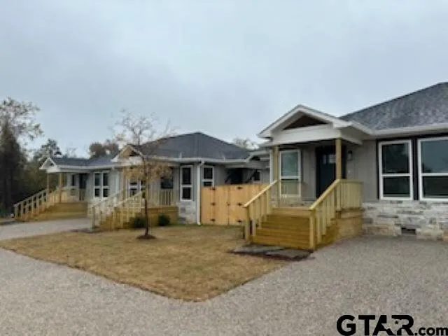 a bathroom with a sink and vanity