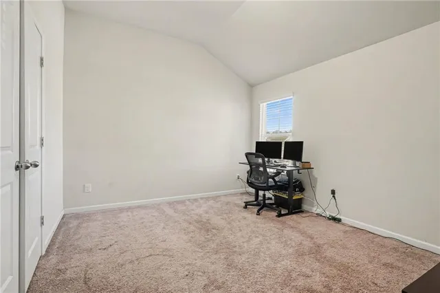 a room with furniture and a flat screen tv