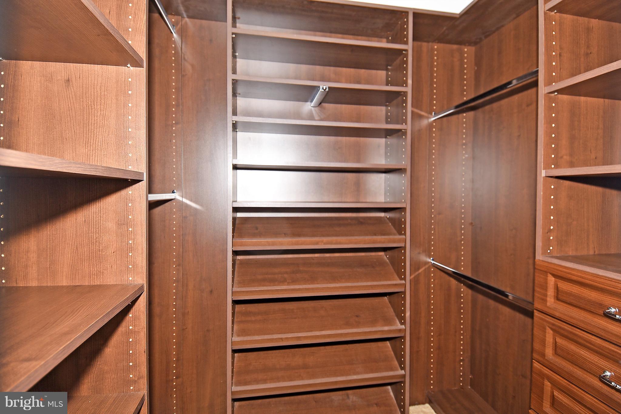 14102 Punch Street Silver Spring, MD 20906 - Photo 20 of 30 a view of walk in closet with empty racks