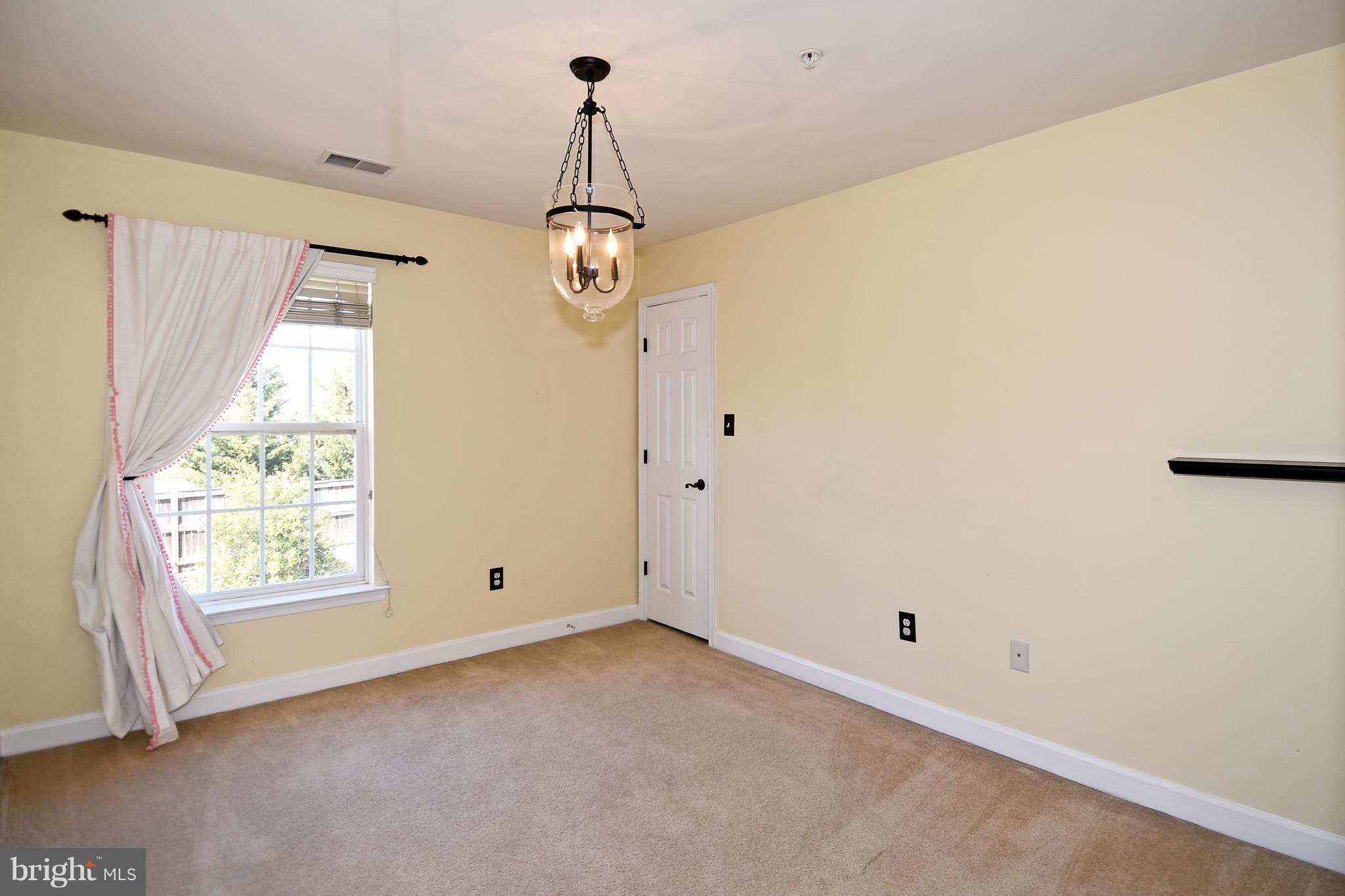 14102 Punch Street Silver Spring, MD 20906 - Photo 23 of 30 a view of empty room with windows