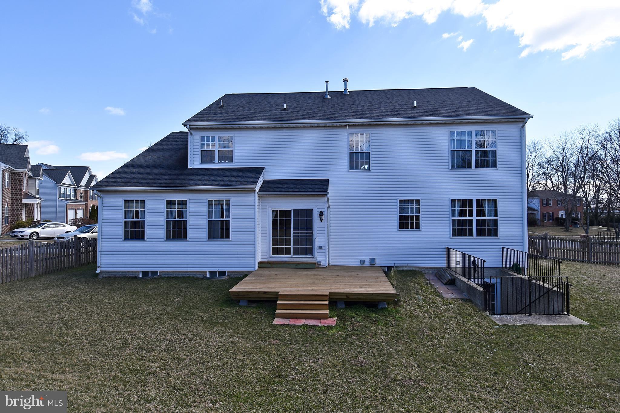 14102 Punch Street Silver Spring, MD 20906 - Photo 29 of 30 a front view of a house with a garden