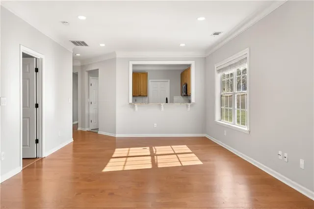 a view of an empty room and window