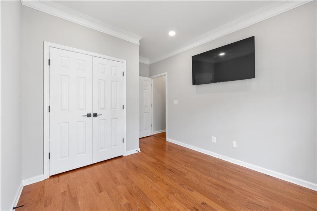 1644 Donovan's Ridge Kennesaw, GA 30152 - Photo 21 of 37 a view of an empty room with wooden floor and closet