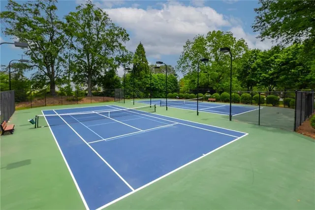 a tennis court that has tennis net