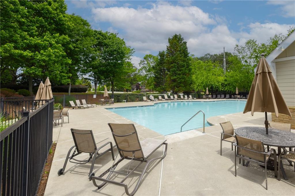 1644 Donovan's Ridge Kennesaw, GA 30152 - Photo 32 of 37 a view of a lake with table and chairs