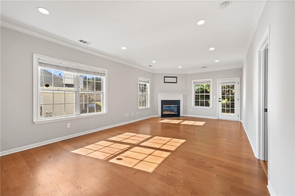 1644 Donovan's Ridge Kennesaw, GA 30152 - Photo 5 of 37 a view of an empty room with a window and a kitchen