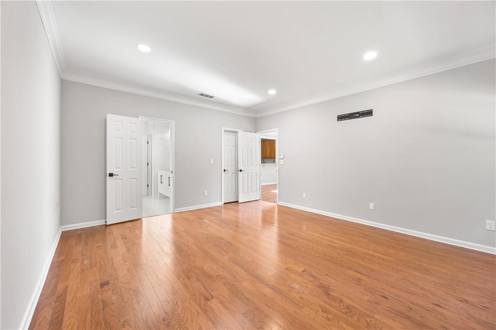 1644 Donovan's Ridge Kennesaw, GA 30152 - Photo 6 of 37 a view of an empty room with wooden floor