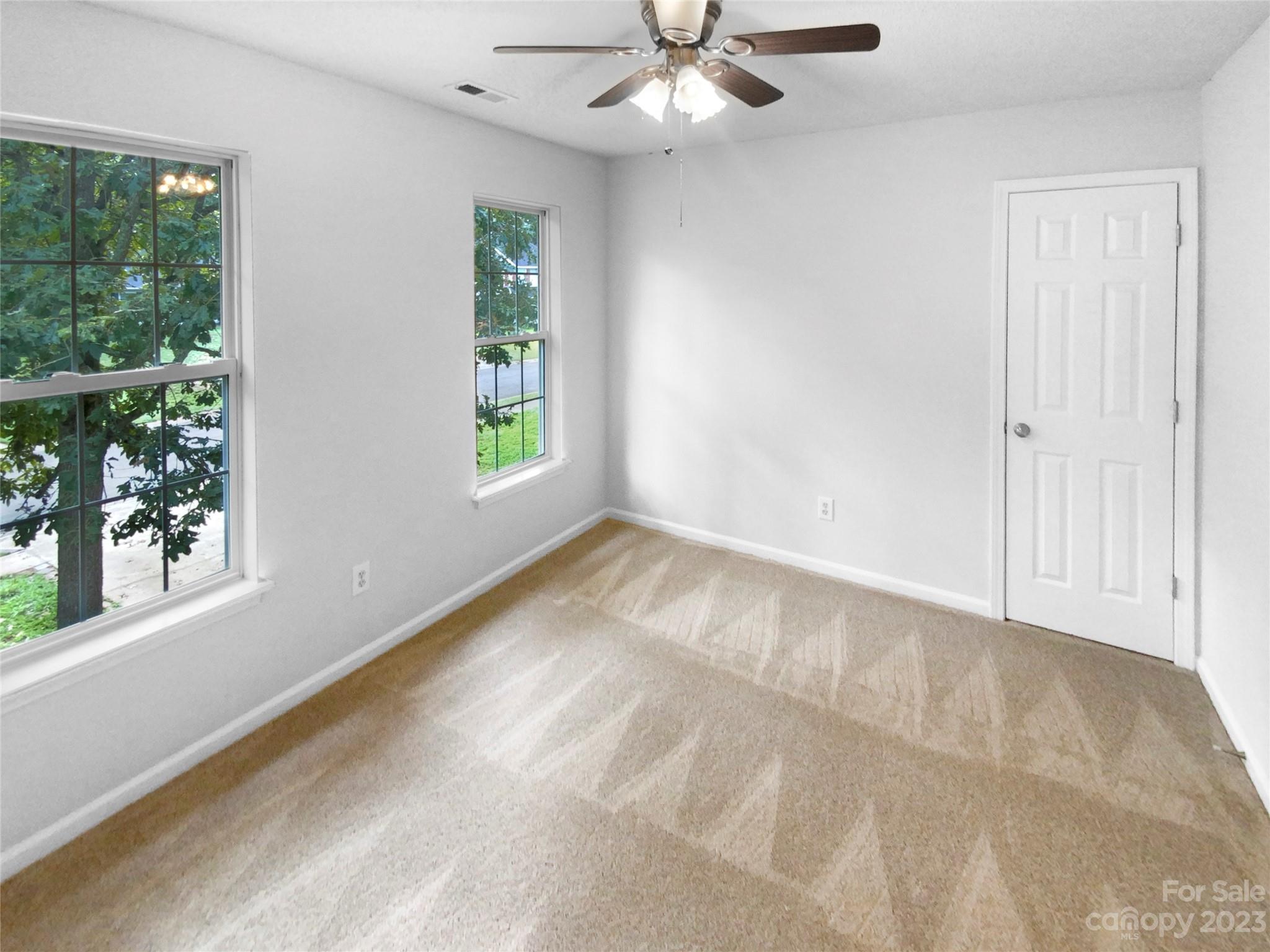114 Shade Tree Circle Fort Mill, SC 29715 - Photo 16 of 20 a view of an empty room with a window