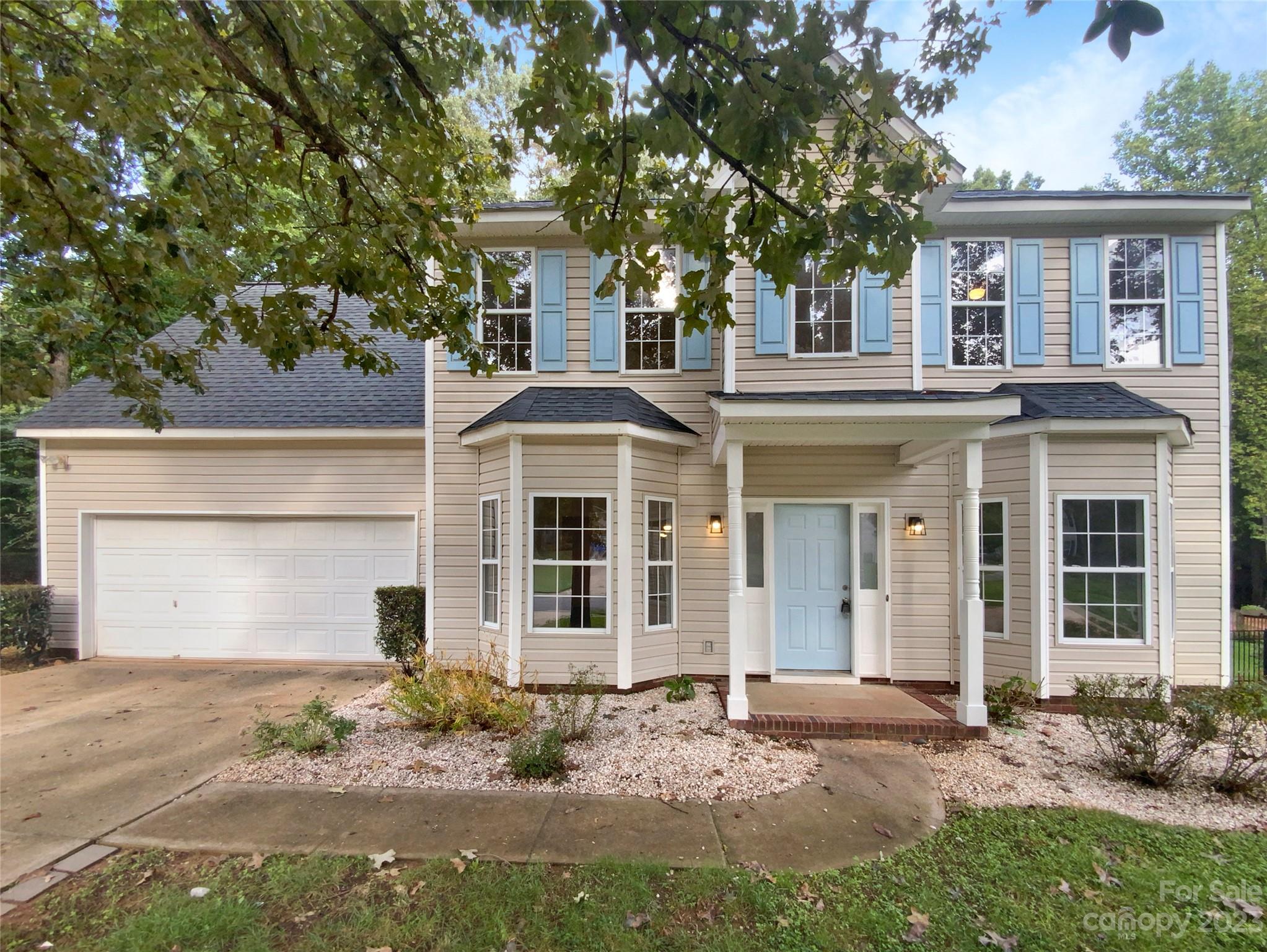 114 Shade Tree Circle Fort Mill, SC 29715 - Photo 7 of 20 front view of a house with a yard